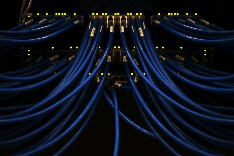 Organized network cables connected to business infrastructure equipment